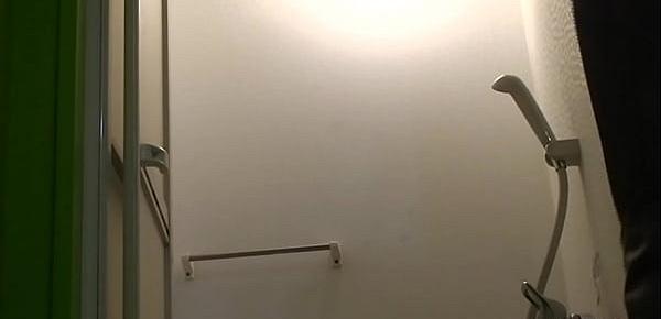  Japanese fishnet girl undressing hidden cam at the bathroom